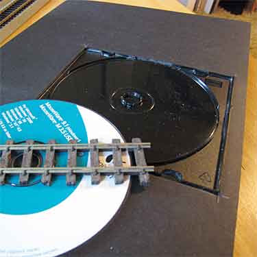 CD case embedded in the baseboard